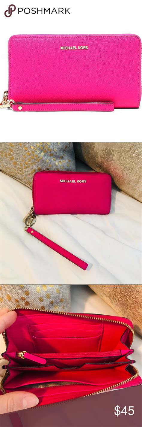 raspberry pink michael kors wallet|Michael Kors pink wristlet wallet.